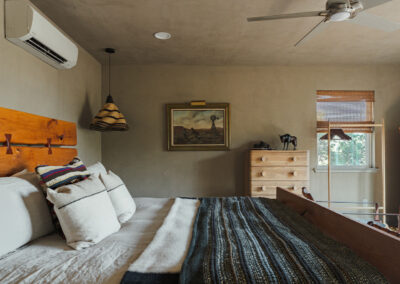 rustic bedroom of the treehouse at hawkins hope ranch